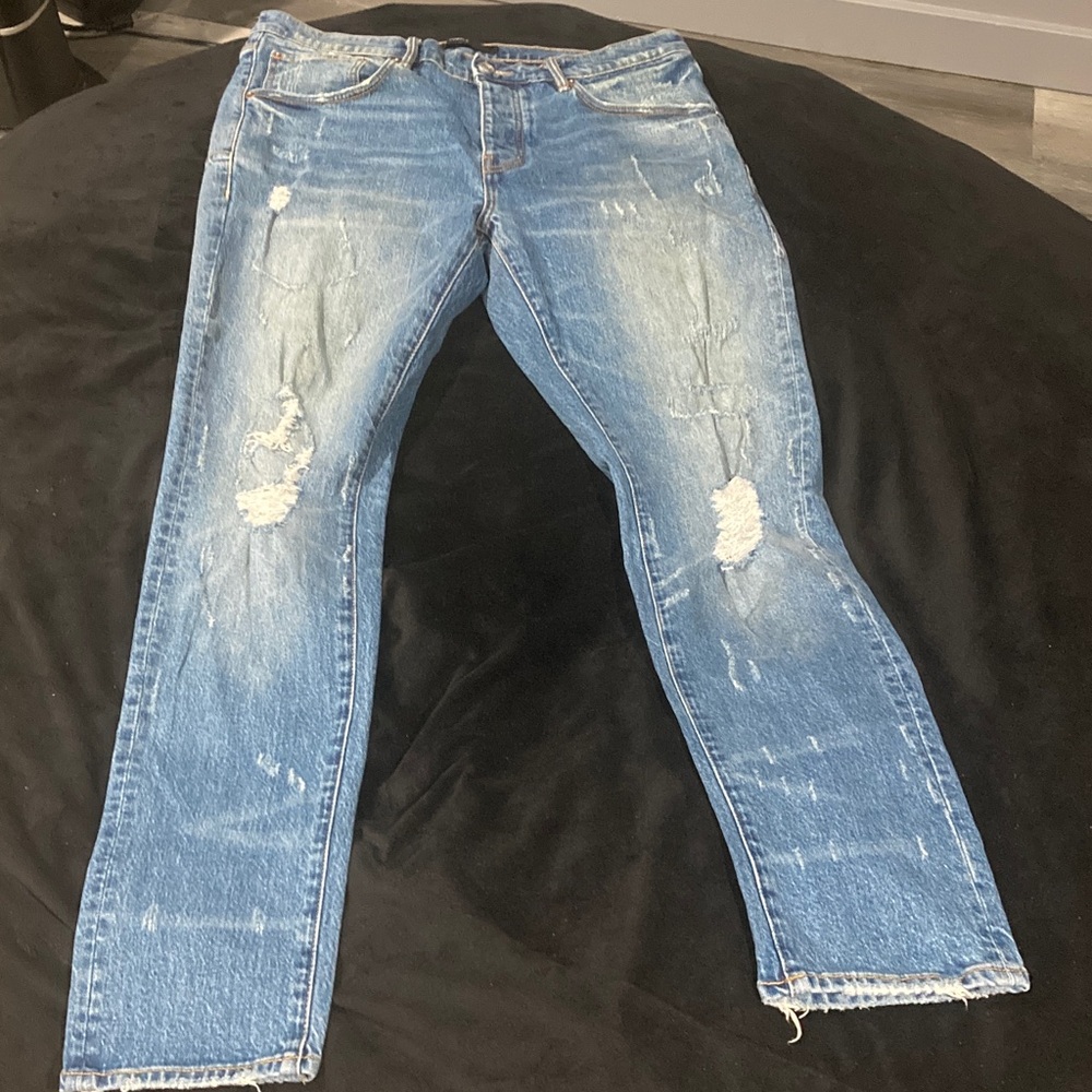 Distressed purple brand Blue Jeans for Men great condition